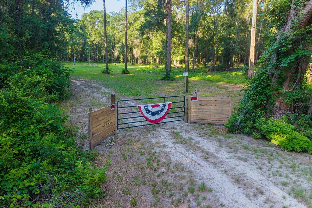 Photo of 6016 SW 52nd Terrace, Lake Butler, FL 32054 (MLS # GC541168)