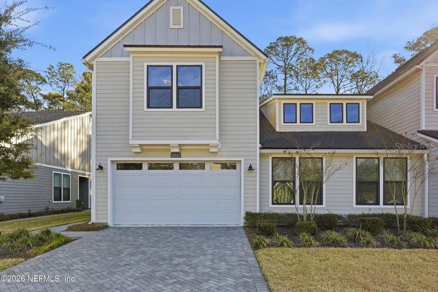 Enjoy the eTown lifestyle in this gated community with a preserve backdrop offering added privacy. This home features a functional layout with a blend of style and comfort, including a gas range, gas tankless water heater, tile flooring in the main living areas, and carpet in the bedrooms. Upstairs, a versatile bonus space can be used as a loft, media room, or additional living area. The paver driveway enhances curb appeal and provides a finished look.

eTown is a thoughtfully planned community with an emphasis on green space and preservation, creating a connected and natural setting. Residents have access to the Recharge amenity center, which includes a resort-style pool, lap pool, fitness center, outdoor spaces, playground, and dog park. Conveniently located near major roadways, shopping, and dining.