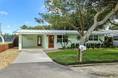Photo of 511 Evergreen Street, New Smyrna Beach, FL 32169 (MLS # NS1089376)