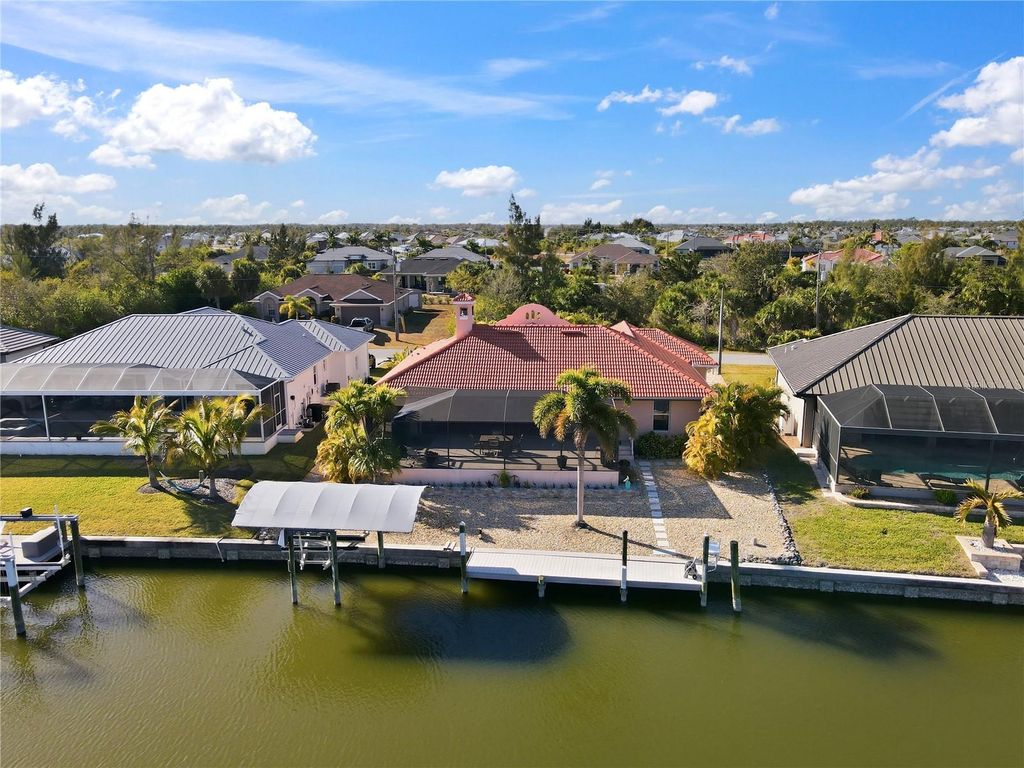 Photo of 8242 Arlewood Circle, Port Charlotte, FL 33981 (MLS # C7521811)