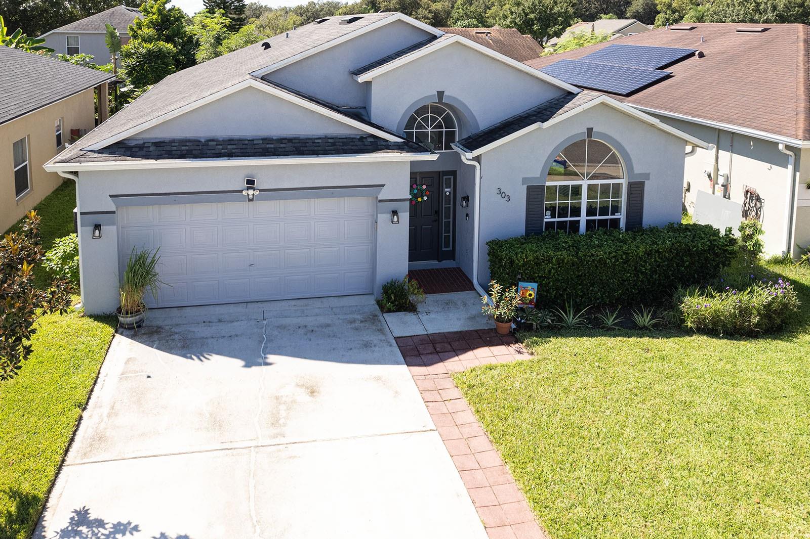 Welcome to a beautifully well maintained home located in a gated community that shows pride of ownership! Upon arrival see the impressive meticulous landscaping, and the manicured back yard is fenced with many special plants and fruit trees. Entering you'll notice this is a great entertaining perfect open plan with the formal living and dining rooms together, and then the kitchen, dinette and family room are together. with lots of open space. The kitchen shows beautiful cherry wood cabinetry with crown molding, island with seating for food preparation and allows the chef to be part of the fun activities! The whole house has hand scraped wood laminate floors throughout with tile in the foyer and bathrooms. This house boasts the following upgrades: roof, 2018, HVAC 11'2019, R-38 cellulose insulation in attic 2022, work bench in the garage, black-out blinds in all the bedrooms, brand new dishwasher 8'2025, front load washer & dryer convey with the house, seamless gutters 2022, wired for whole house generator 2022, irrigation system and consol updated 2023 & 2024, new windows & sliders 2019 & 2023, garbage disposal 2023! Close to major roads, shopping, grocery, parks and trails. Home may be under audio and/or visual surveillance. Welcome home!