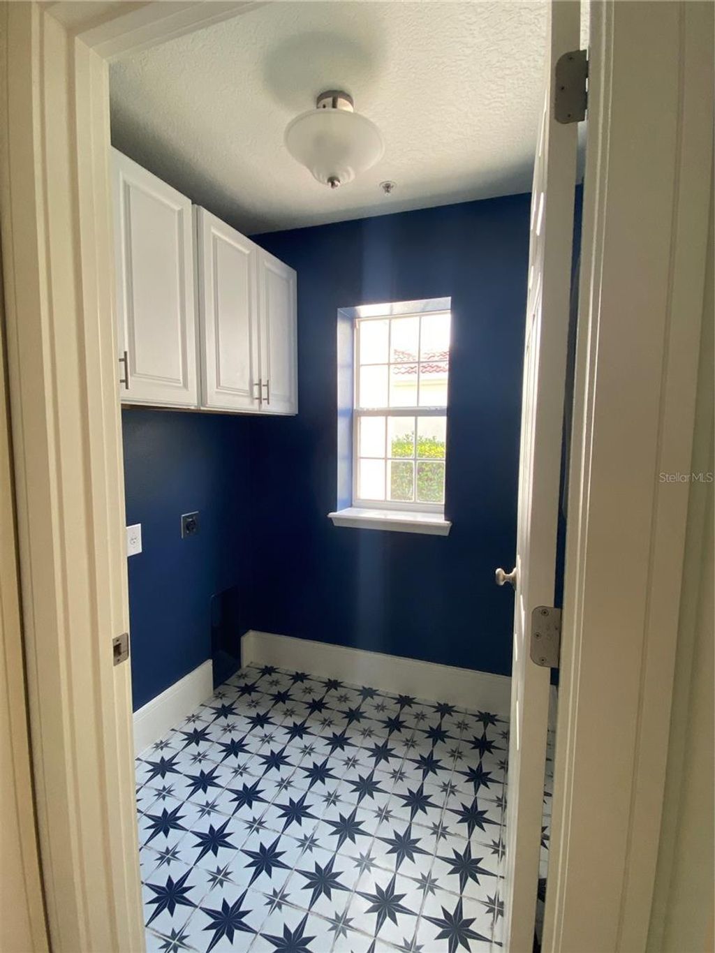 Photo of 2856 Kemper Avenue, Orlando, FL 32814 (MLS # O6427287)