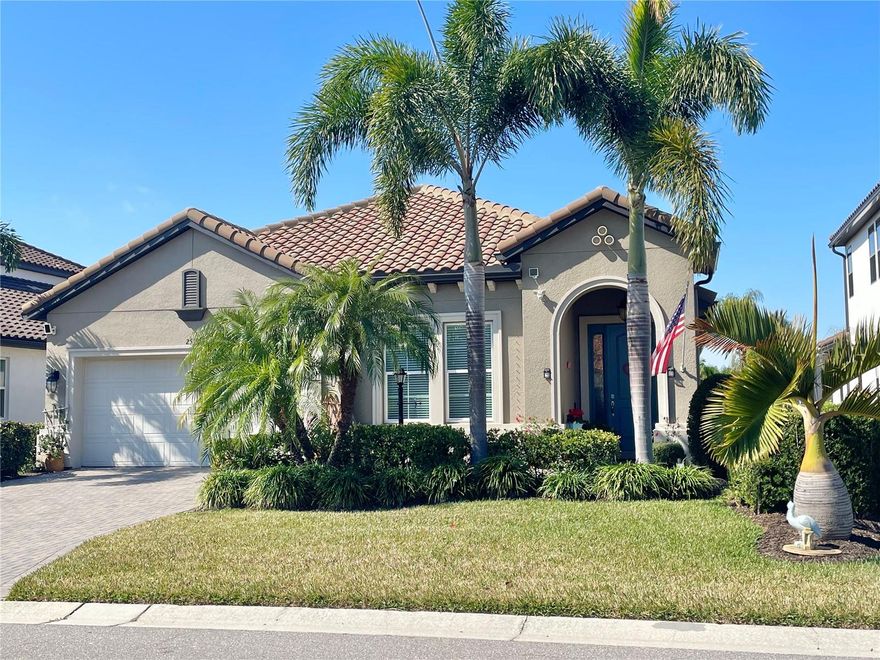 Welcome to the gated Mediterranean inspired community of Bougainvillea Place.  This M/I built Braden model was completed in 2019 with a ton of upgrades providing 2139 sf, 3 bedroom, open concept, an additional office/flex space in the front of the home, could easily be another bedroom.  Once inside, you will find a very spacious kitchen with stainless GE Profile appliances, a ton of cabinets, a generous amount of prep space and large island with Quartz countertops. The great room opens onto a covered and screen lanai with an exterior extended pavered area and a pond view. The main suite is located at the back of the home and has an additional bonus space, currently a sitting area and could be utilized many ways. You will find spacious walk-in closet with plenty of shelving, the primary bath with double sinks, a large enclosed shower and soaking tub. Two additional bedrooms as well as a large laundry room are in the middle of the home. You will notice the upgraded lighting, fans, custom blinds and certainly appreciate the high ceilings.  The home provides a water softener system, a Air Scrubber home air purification system, in-wall pest control and overhead storage is installed in the garage. HOA includes lawn maintenance, irrigation, pest control, clubhouse, fitness center, a seasonally heated pool w/cabanas and a “paw park”. NO CDD fees and NOT in a flood zone. Hard to beat this close in location, just minutes off I-75, exit 224. Bougainvillea Place main gate is near the Ellenton Outlet Mall entrance. Easy access to Bradenton, Lakewood Ranch, Sarasota and all of Tampa Bay. Close to shopping, restaurants, medical facilities, numerous sporting venues and all our beautiful Gulf beaches.