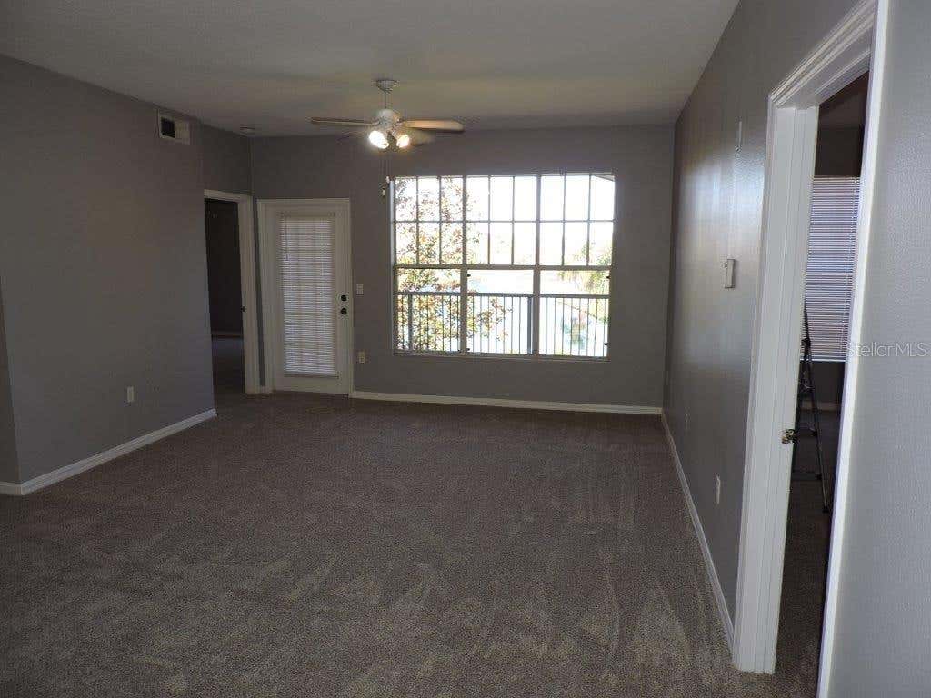 Photo of 5542 Metrowest Boulevard #7-208, Orlando, FL 32811 (MLS # O6432224)