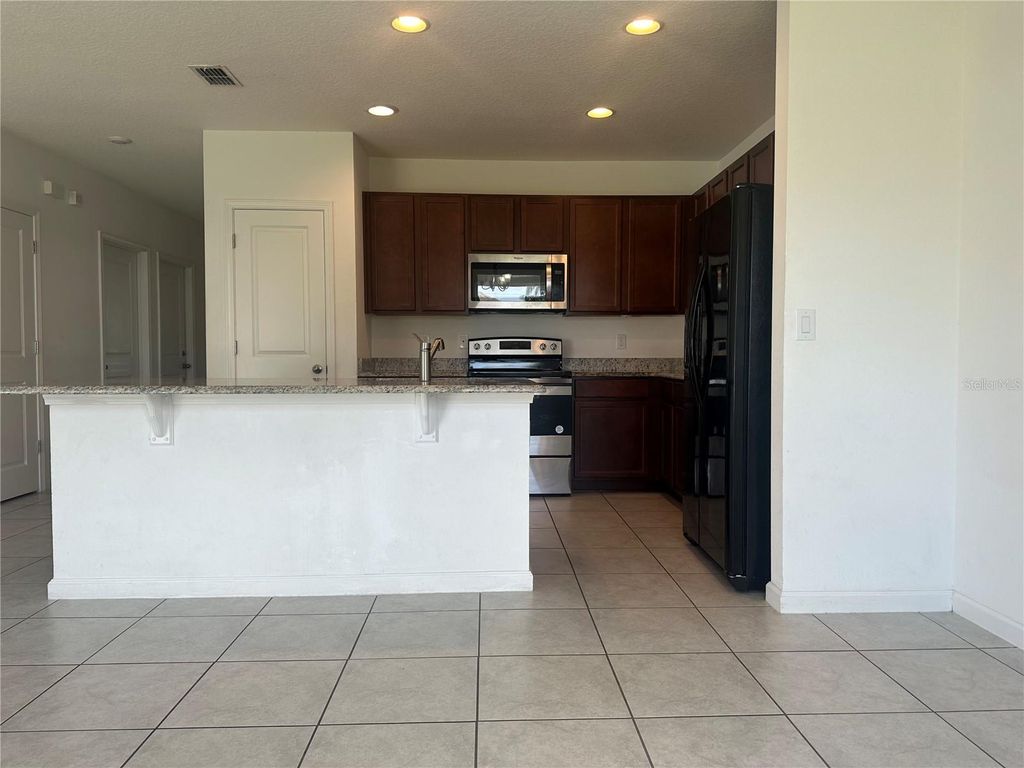 Photo of 819 Fillmore Court, Davenport, FL 33837 (MLS # S5141019)