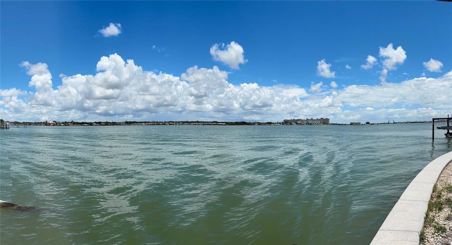 Indulge in the ultimate coastal sanctuary with this exceptional waterfront estate, nestled at the end of a peaceful cul-de-sac. Wake up to sweeping, unobstructed vistas of sparkling Boca Ciega Bay and the shimmering Intracoastal Waterway. Boasting an impressive and rare 108 feet of direct waterfrontage, imagine your yacht moored just steps from your door, offering effortless access to world-renowned fishing and aquatic adventures in the Gulf and Bay. Savor the quintessential Gulf Coast lifestyle with a leisurely stroll, bike ride, or golf cart cruise to the tranquil sands of Redington Beach. This charming residential community offers a delightful array of local eateries, shops, and vibrant entertainment options, all within easy reach. Picture yourself enjoying breathtaking sunrises over the water and the convenience of nearby amenities. Your idyllic coastal life awaits – start living your waterfront dream today!