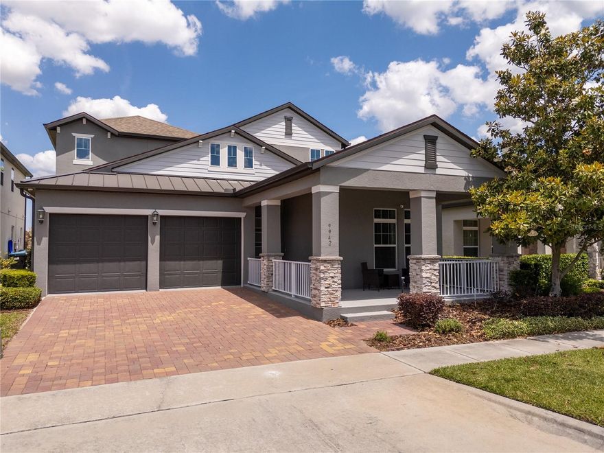 Former model home now available for sale in the highly desirable Watermark community of Horizon West! This nearly new residence has been lightly used as a second home and remains in pristine condition, offering the perfect blend of luxury, comfort, and convenience—without the wait for new construction.

This beautifully upgraded home showcases custom designer finishes throughout, including extensive wood wall paneling, modern vinyl flooring with no carpet, and fully renovated bathrooms that elevate the overall design. The thoughtfully designed layout features a spacious gourmet kitchen with quartz countertops, elegant cabinetry, and a large center island—ideal for entertaining and everyday living.

The main level offers a private guest suite, a half bath with direct access to the pool area, and a versatile flex space currently used as a gym, easily adaptable as a formal dining room or home office. An additional open area near the living room provides the perfect setting for a workspace or playroom.

Upstairs, the owner’s suite serves as a relaxing retreat, complemented by two additional bedrooms, a shared bathroom, and ample storage space.

Step outside to your private outdoor oasis featuring a north-facing pool that allows for natural sunlight throughout the day while maintaining a shaded and comfortable lanai area. The fully fenced backyard provides added privacy—perfect for enjoying Florida living year-round.

Located in the heart of Winter Garden, within the sought-after Horizon West area, residents of Watermark enjoy resort-style amenities including a pool, splash pad, playground, tennis courts, recreational center, and outdoor amphitheater. Conveniently situated just minutes from Disney and with easy access to SR-429, offering seamless connectivity throughout Central Florida.