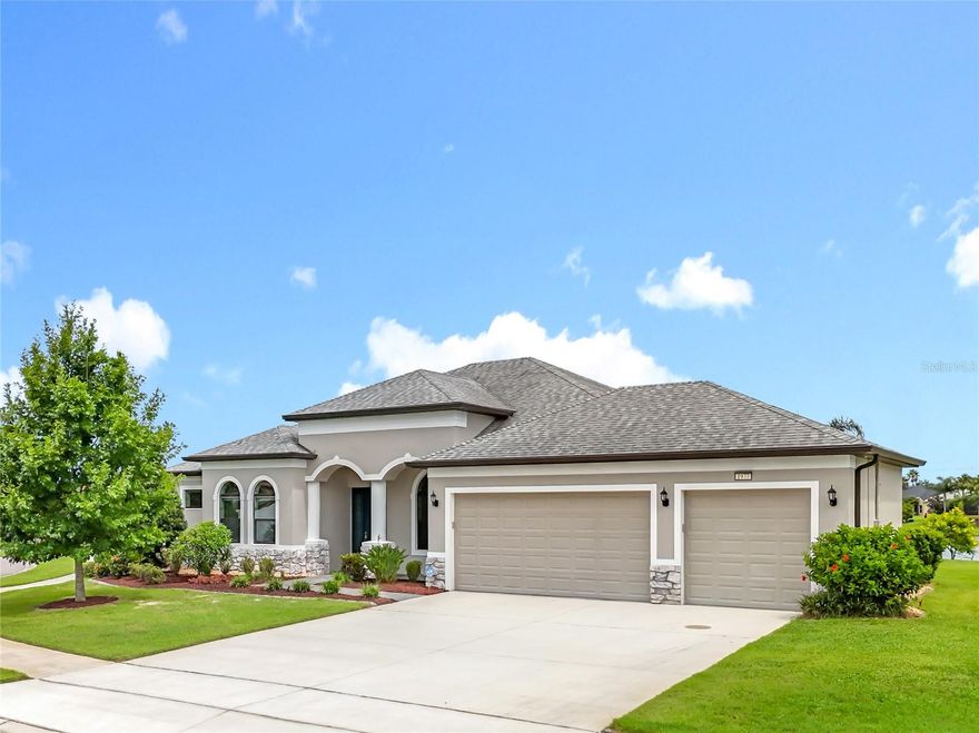 "Who says winter is too cold for a swim?  Enjoy the luxury of a heated, salt-water pool all season long." 
Elegance and lakefront living come together in this beautifully designed single-level residence, complete with a pool and three-car garage.    Nestled on an oversized lot with no neighbor to the left and a water view second to none - this home offers an enhanced sense of privacy and a more expansive outdoor setting.  The perfect vantage point to enjoy the beauty of the natural landscape and its thriving wildlife.
Thoughtfully designed, the home blends an open-concept layout with well-appointed separate spaces.  The private in-law suite, complete with its own kitchenette and full bath, offers the perfect retreat for guests or multigenerational living.  Adjacent to the primary suite, the primary bathroom is designed with dual 48-inch vanities and sinks, enhanced by a central makeup area for added functionality. Outdoors, a sparkling pool overlooks 4.5 miles of serene lakes -- an extraordinary setting for relaxation or gatherings.  Best of all, you can glide straight from your home's edge into the lakes by electric boat, kayak, canoe or any craft that is not powered by gas.
Icynene insulation delivers superior thermal performance and energy efficiency reducing monthly costs.  This product also comes with a transferable warranty, offering added value and peace of mind for the new owner.  Refined finishes, seamless functionality, and exceptional views combine to create a home that embodies the very best in luxury living.
The community itself is truly second to none, centered around an impressive 18,000 sq. ft. clubhouse offering something for everyone.  Inside, you'll find a card room, library, billiards room, craft room, fitness center, and a spacious social hall that hosts a variety of entertainment and events.  Step outside to enjoy the resort-style pool, cozy fire pit - perfect for winter evenings and s'mores - and a wide array of sports amenities including tennis, pickleball, croquet, bocce ball, a softball field, and even cornhole.  Residents also enjoy private golf cart access to the Country Club of Mount Dora where you can lunch or dine at the restaurant or take on the challenge of its beautifully maintained golf course.  A future boat ramp will provide access for residents to launch their gas-powered boats onto scenic Loch Leven Lake.  For added convenience your $280 monthly HOA fee also includes secured, fenced storage for boats and RVs.  Furthermore, within 10 minutes you can be strolling through historic Mount Dora, enjoying its renowned restaurants, charming boutiques, and unforgettable small-town character.  The lifestyle here leaves little to be desired!