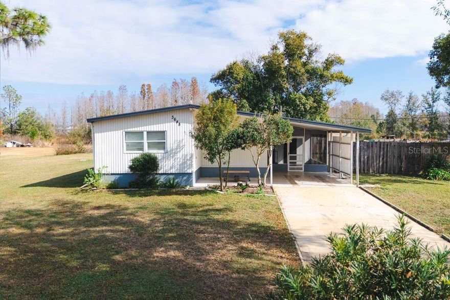VERY MAINTAINED 1982 MANUFACTURED DOUBLEWIDE MOBILE HOME. ALL ON ONE ACRE. TAX RECORDS DO NOT REFLECT ADDITIONAL 13x10 SUN FLORIDA ROOM FOR A TOTAL OF 1090 SQ FT APPROX. ALSO HAS SPACIOUS 11x17 SCREENED IN PORCH, WKIN CLOSETS, NEUTRAL COLORS, HAS 8x11 UTILITY ROOM , AND WORKSHOP.SELLER WILL LEAVE WASHER AND DRYER. PROPERTY IS HIGH AND DRY AND BACKS UP TO CONSERVATION. HAS A BEAUTIFUL EVEN LANDSCAPE IN BACKYARD. MOST POSSIBLY ENOUGH SETBACK AND ROOM TO BUILD A BLOCK HOME BEHIND CURRENT RESIDENCE AND NOT DISTURB WELL & SEPTIC. PROPERTY BEING SOLD AS IS WITH RIGHT TO INSPECTION