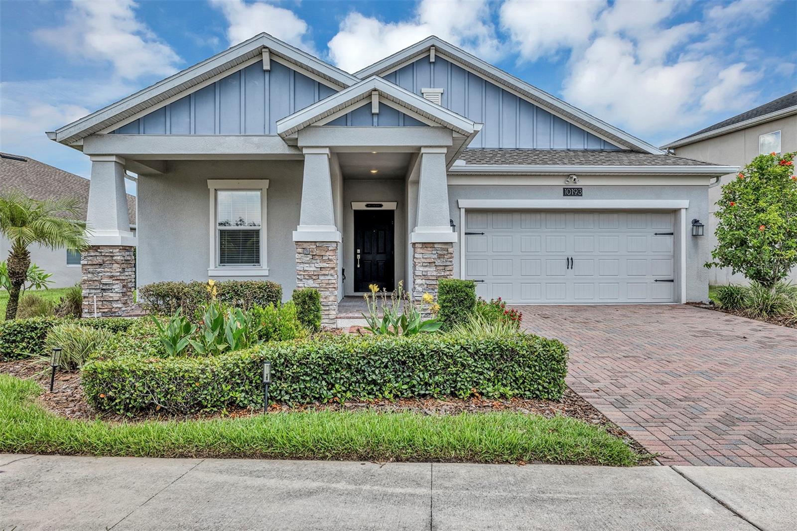 Nestled among century-old oak trees, The Oaks at Moss Park offers a relaxed lifestyle just minutes from Lake Nona. This single-story residence sits on an oversized lot with exceptional curb appeal and a welcoming front porch. Inside, you’ll find 3 bedrooms and 2 bathrooms, complemented by mature landscaping and a fully fenced yard that frames a picturesque water view. The centerpiece of the property is a sleek private pool overlooking the water—perfect for both quiet relaxation and entertaining guests. Beyond the home, residents of The Oaks at Moss Park enjoy community parks, playgrounds, and trails, along with convenient access to shopping, dining, major highways, and Orlando International Airport.