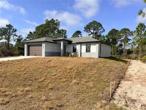 Photo of 724 Drury Avenue, Lehigh Acres, FL 33974 (MLS # A4686080)