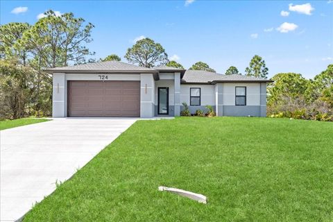 Photo of 724 Drury Avenue, Lehigh Acres, FL 33974 (MLS # A4686080)