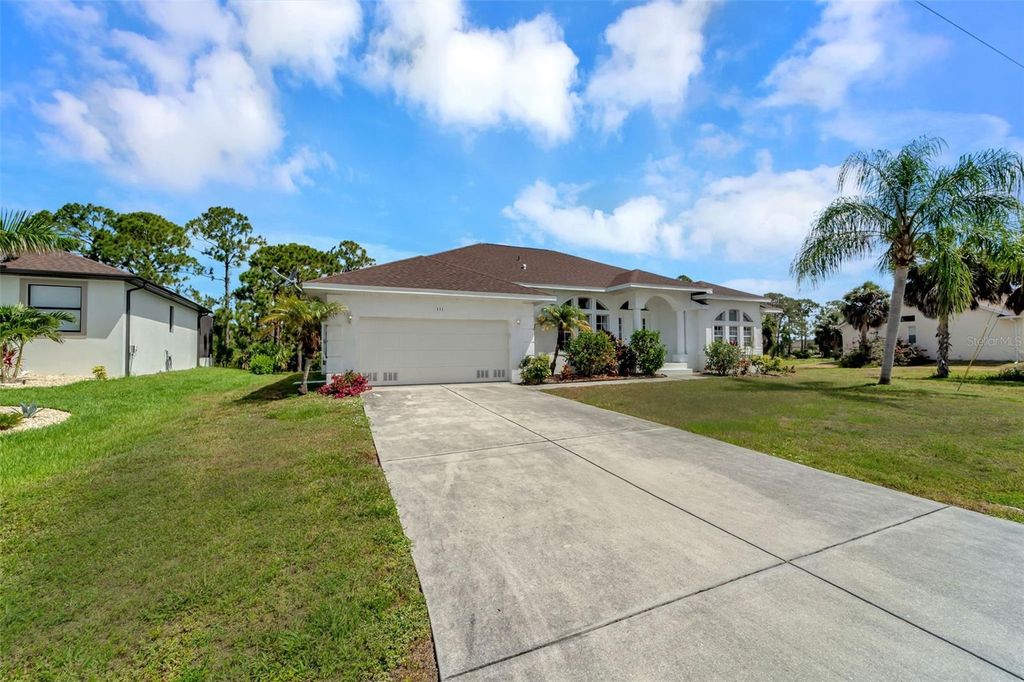 Photo of 131 White Marsh Lane, Rotonda West, FL 33947 (MLS # D6138978)