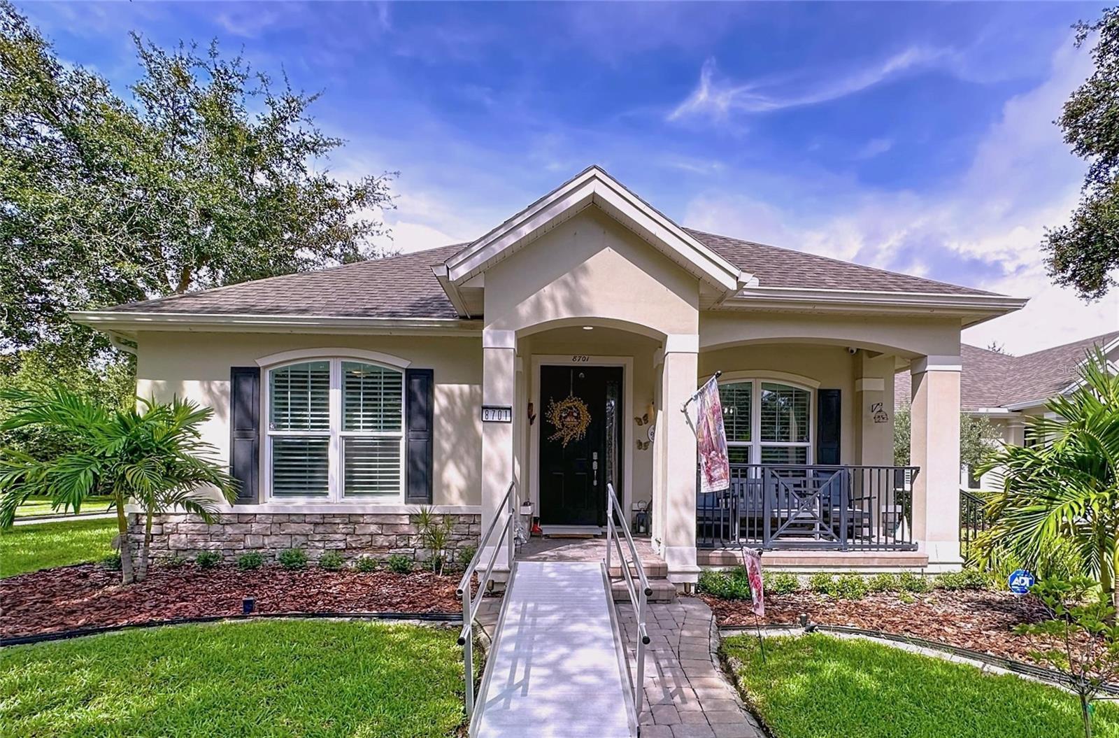 Motivated Seller!! IMAGINE LIVING HERE in Beautiful CORNER LOT home across from one of the parks in the highly coveted Northlake Park community, at the heart of Lake Nona. You will see that “PREMIUM QUALITY” defines every detail of its construction and extensive upgrades that transformed the home into approximately “3,300 SqFt of heated area.” As you enter through the front porch in elegant “Pavers” and into this 3 SPACIOUS Bedrooms, 2.5 MODIFIED Baths residence, you will notice the expanded and versatile floor plan with a Private Office ideal for working from home, a small Closet and a convenient custom BUILT-IN Mud Room with stone seating and storage compartments, leading to a staircase equipped with an ELECTRIC LIFT that takes you up to a cozy Bonus Room converted into your own private “HOME THEATER,” with a giant screen, HIGH RESOLUTION 4K projector, remote-controlled dim lighting, 8 custom “reclining seats” plus 3 sofas with ottomans to seat 6, and a candy bar with mini fridge and microwave for the perfect movie night setup. The OVERSIZED GARAGE features an epoxy floor, access ramp, stainless steel Sink, and "Workshop" space, as well as an impeccably designed storage system and a driveway in pavers. The grand KITCHEN was thoughtfully redesigned with QUARTZ countertops, tile backsplash, QUIET-CLOSE cabinets with BUILT-IN LED lighting, professional organizers, and high-end stainless-steel appliances including dishwasher, fridge, oven, built-in microwave, and glass cooktop. Additional touches include a KOHLER apron-front sink with “QUIET DISPOSAL SYSTEM,” oversized pullout bins, and a WALK-IN PANTRY with custom shelving. Includes “Smart Dryer with FLEXDRY” and “Smart Washer with FLEXWASH”. The EXTENDED Family Room features a SHIPLAP ACCENT WALL and an ELECTRIC FIREPLACE with stone floating shelves, while French doors, open to the BUILT-IN PORCH with “ELECTRIC SCREEN” leading to a paver patio featuring a “DOUBLE ISLAND GRILL” by Paradise Grills under a gazebo. The MASTER SUITE is a luxurious retreat with tray ceiling, an OVERSIZE CUSTOM WALK-IN CLOSET with built-ins, a reinforced door housing a VAULT with the VIDEO SURVEILLANCE hub, and a SECOND WALK-IN CLOSET in the bathroom. The spa-like bath includes “HIS AND HER” vanities with waterfall edges, KOHLER faucets, a custom-built LUXURY DOUBLE SHOWER with farm-style glass doors, and linen closet. This residence combines modern amenities with FARMHOUSE STYLE charm. Energy efficiency upgrades include SOUND-INSULATING DOUBLE PANE LOW-E WINDOWS with elegant “FAUX WOOD SHUTTERS,” newer HVAC, COMMERCIAL-GRADE roof shingles, Leased SOLAR PANELS, WATER SOFTENER, “FIRE SPRINKLER SYSTEM,” and interconnected “Smoke and Carbon Monoxide detectors with Voice”. As part of NORTHLAKE PARK, homeowners enjoy MEMBERSHIP to the “Lake Nona YMCA”, included in HOA dues with access to gym, Olympic-size swimming pool, tenis and basketball courts, private dock on Lake Nona, pavilion, and community events. This home is located just minutes from MEDICAL CITY, VA HOSPITAL, ORLANDO INTERNATIONAL AIRPORT, top-rated schools, dining, shopping, and the upcoming Lake Nona Branch Library and Southeast Government Center less than a mile away. Accessible features make this home ideal also for seniors or those with disabilities, with accommodations from the entrance to the garage. A home like this WILL NOT LAST. Schedule your Private Showing today!! For additional information call or text.
