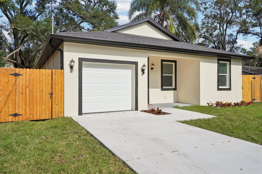 Photo of 1606 E Maple Ave, Tampa, FL 33604 (MLS # TB8454125)