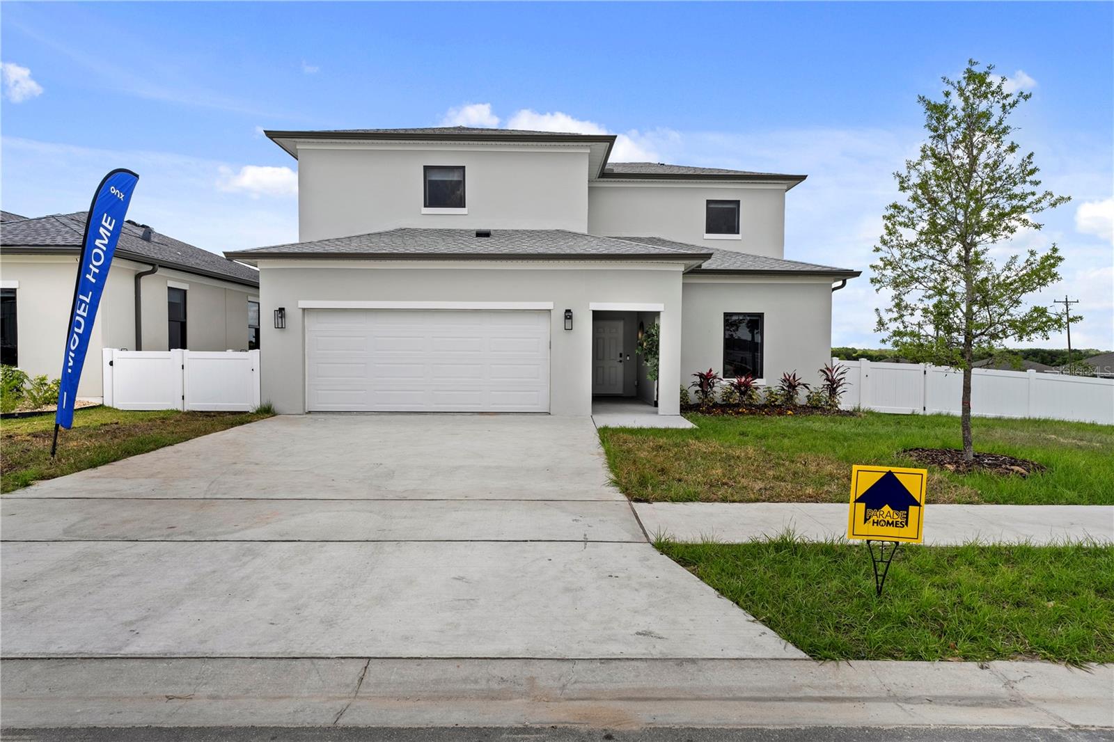 On Villa Pass, located in Groveland, FL, is a welcoming, family-friendly community featuring 200 preconstruction single-family homes. We provide a range of exquisitely designed homes with diverse facades and interior options, allowing you to customize your dream living space. This home includes 4 bedrooms, 3 full baths, a modern open kitchen, energy-efficient appliances, a spacious backyard, access to a community park, and the enjoyment of a scenic nature trail along the community’s edge.
At Onx Homes, we take pride in our standard, which includes cutting-edge X+ Construction™ features, a fully concrete foundation, hurricane impact-proof windows and doors, sleek quartz countertops, energy-efficient appliances, and luxurious porcelain tile flooring in our homes in Groveland, FL. Our commitment to these elements ensures that your home is not only beautiful but also built to withstand the elements. *Disclaimer* Images are of model home. Actual home will vary in finishes, features and colors. Images of model home are
for reference only.