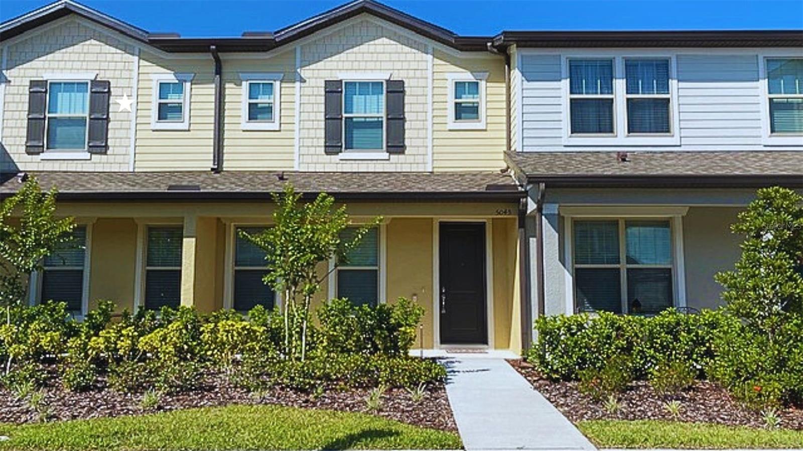 Available August 1st! This beautifully upgraded 2-bedroom, 2.5-bathroom townhome is nestled in the highly sought-after Lakeshore at Narcoossee community. The home features a spacious open-concept layout, a modern kitchen with granite countertops, stainless steel appliances, and a generously sized living area perfect for entertaining. Additional highlights include a two-car garage and thoughtfully designed interior finishes throughout. Residents enjoy access to top-tier amenities including a resort-style pool, fitness center, dog park, and basketball court. Conveniently located near dining, entertainment, and recreational parks, this home offers the ideal blend of comfort and convenience. Inquire today, this gem won't last long!