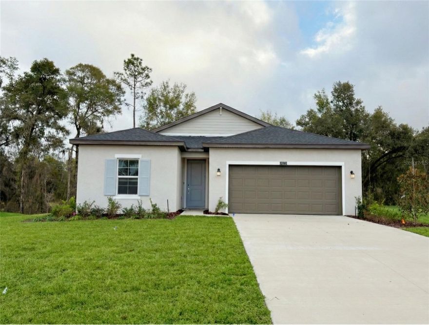 Welcome to your dream rental home in the highly exclusive Grand Park community in Dunnellon! This stunning 4-bedroom, 3-bath residence offers 1,978 square feet of modern comfort and style. Featuring elegant vinyl and ceramic flooring, soaring 9-foot ceilings, and a gourmet kitchen with quartz countertops, and brand-new stainless-steel appliances, this home is designed to impress. The layout includes a cozy breakfast area perfect for casual mornings and a formal dining space ideal for entertaining. From there, the open concept flows seamlessly to the covered lanai, perfect for relaxing outdoors. The property sits on a large lot with no rear neighbors and ample space on both sides, offering privacy and tranquility. With a 2-car garage and a covered patio, this home blends convenience and sophistication. Best of all, residents of Grand Park enjoy private access to the beautiful Rainbow Springs, making this an unparalleled lifestyle opportunity.