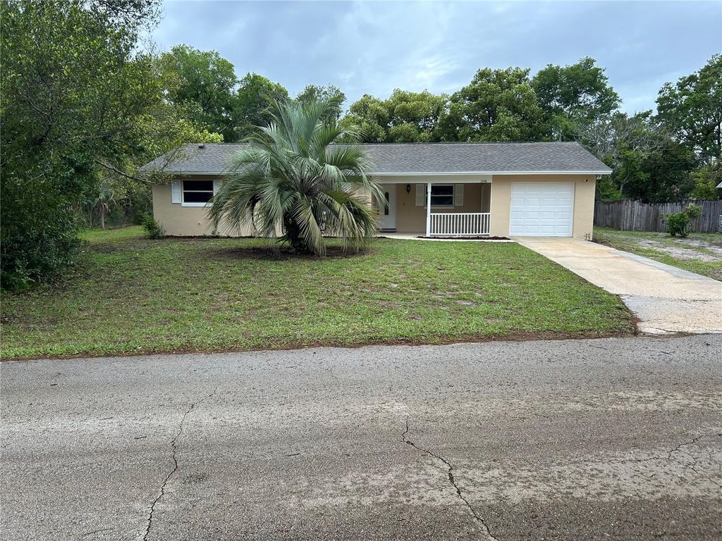 Photo of 1548 Baltimore Avenue, Deltona, FL 32725 (MLS # V4948387)