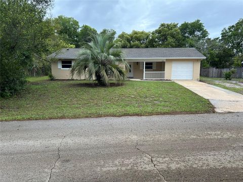 Photo of 1548 Baltimore Avenue, Deltona, FL 32725 (MLS # V4948387)