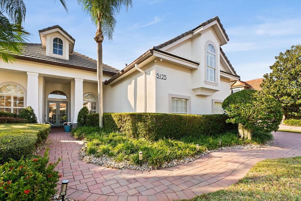 Photo of 5125 Keeneland Circle, Orlando, FL 32819 (MLS # O6365468)