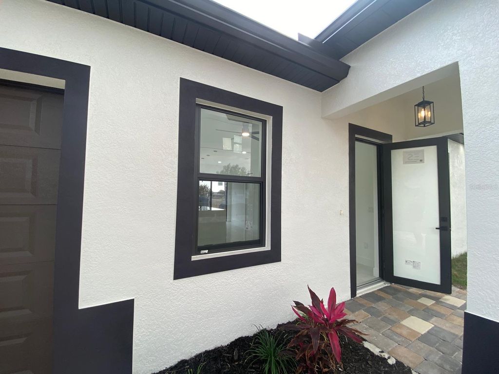 Photo of 3303 13th Street W, Lehigh Acres, FL 33971 (MLS # TB8374707)