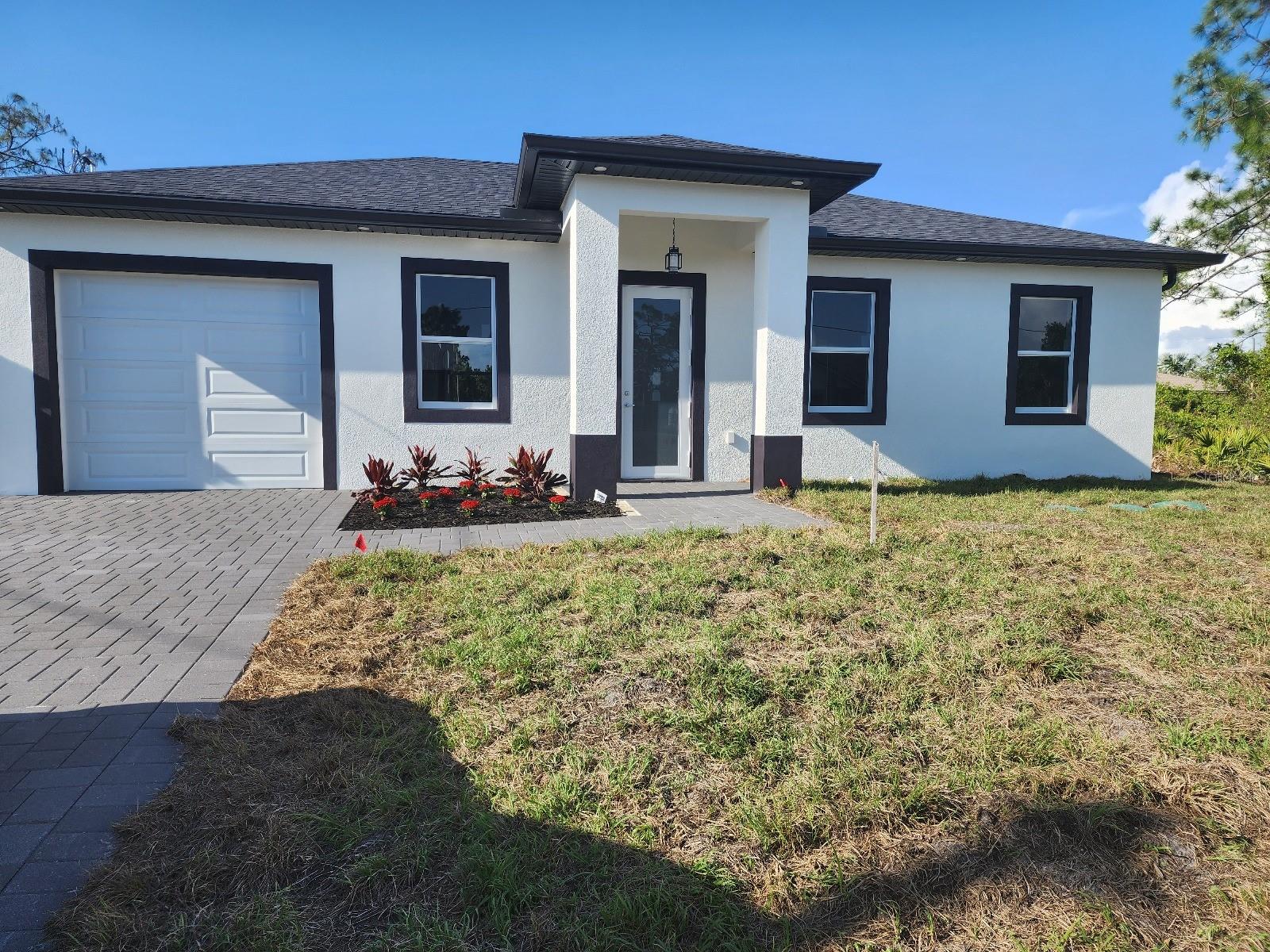 Under Construction. A unique investment opportunity in Lehigh Acres!
The seller is offering $10,000 towards closing costs, making this home an even more attractive deal.
This property at 3303 13th St W is currently under construction and is scheduled for completion in October 2025. Take advantage of this opportunity to customize your future home to your liking before it’s finished.
Located at the end of a quiet cul-de-sac, this home offers privacy and peace, while still being in a central area of Lehigh—just 2 minutes from Lee Blvd. Designed with flexibility in mind, the layout allows the garage to be easily converted into an in-law apartment, giving you even more options for living space or rental income.
Don’t miss the chance to secure it before construction is completed and its value increases.
Contact us today and lock in your future home!