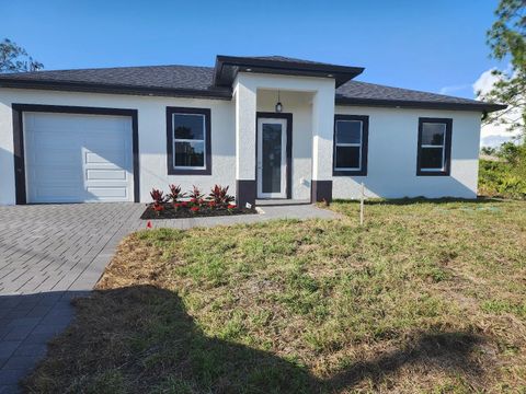 Photo of 3303 13th Street W, Lehigh Acres, FL 33971 (MLS # TB8374707)