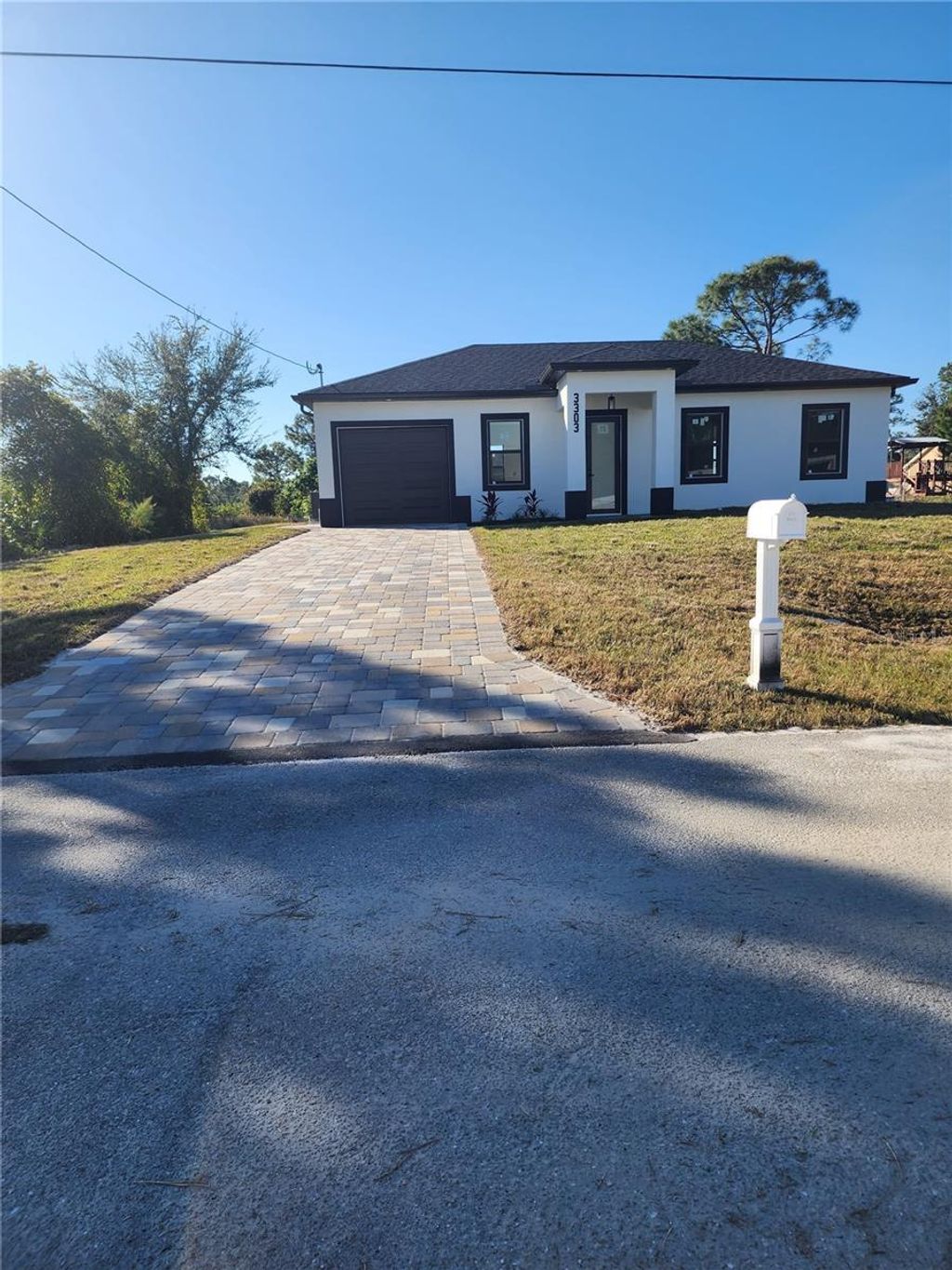 Photo of 3303 13th Street W, Lehigh Acres, FL 33971 (MLS # TB8374707)