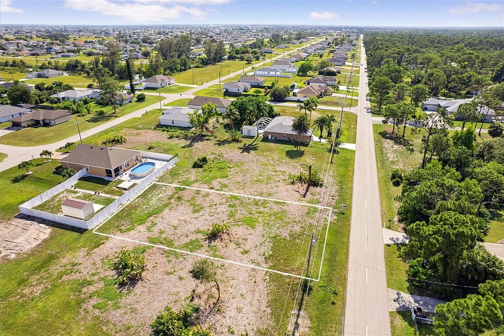 Photo of 614 Jacaranda Parkway E, Cape Coral, FL 33909 (MLS # A4701169)