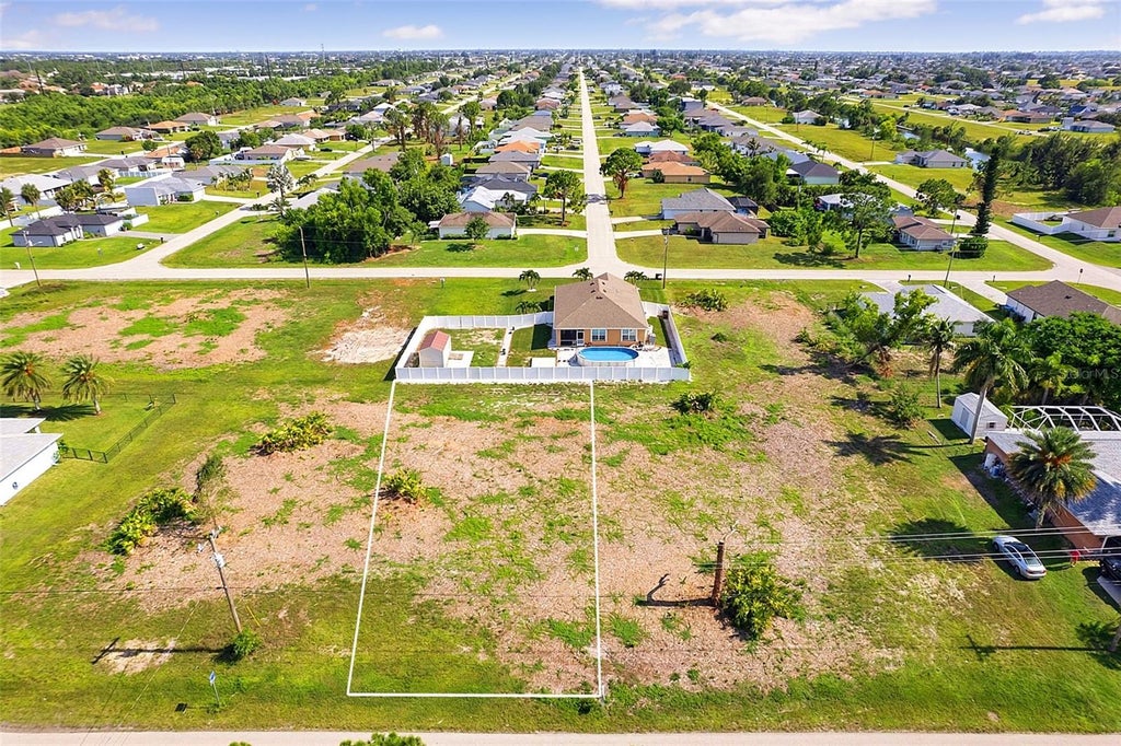 Photo of 614 Jacaranda Parkway E, Cape Coral, FL 33909 (MLS # A4701169)