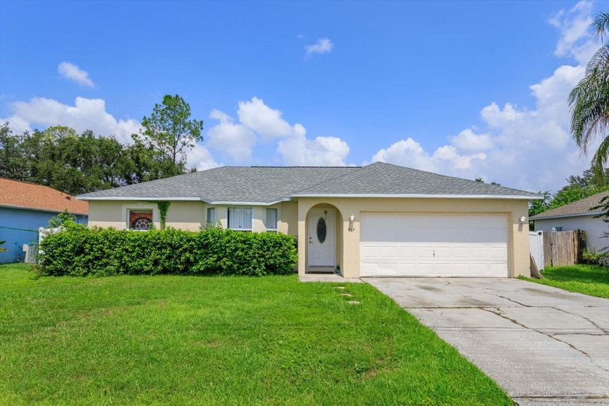 PRICE REDUCTION!! BRAND NEW ROOF, A/C, water heater, a new kitchen including granite countertops, wooden cabinets, all stainless steel appliances and even new wood flooring through out the kitchen and living area. Relax in the screened in lanai year round or enjoy the large fenced in yard perfect for pets, a playground or a garden. This home is ready to go! (HOA includes cable)