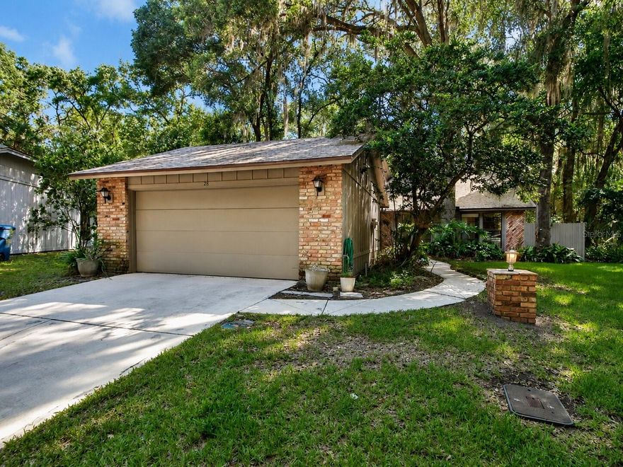 Trails West is one of DeLand's early developments, known for the wide variety of home styles and beautiful oak trees. Located on the Northside of DeLand with less traffic, but still 10 minutes to Award Winning Downtown DeLand, shopping, and the Hospital. 28 Ramblewood is located in the front area of Trails West, known as Oakwood. This early 1980's built home features two main bedrooms, and a 3rd room which can be an office or a bedroom, it has closets. Boths bathrooms have been updated and look amazing. The kitchen is well equipped with newer appliances and eating space, natural lighting comes from the large windows and sliding glass doors bring in the outdoor sights. There is a formal dining room with laminate flooring. The living room features a vaulted ceiling and brick fireplace as well as sliding glass doors to the back patio. The main traffic areas are a wood laminate or tile. The architectural shingled roof was replaced in September of 2022. The Trails West Community Pool is just a short walk away from 28 Ramblewood Trail. Don't miss out on this affordable community living.