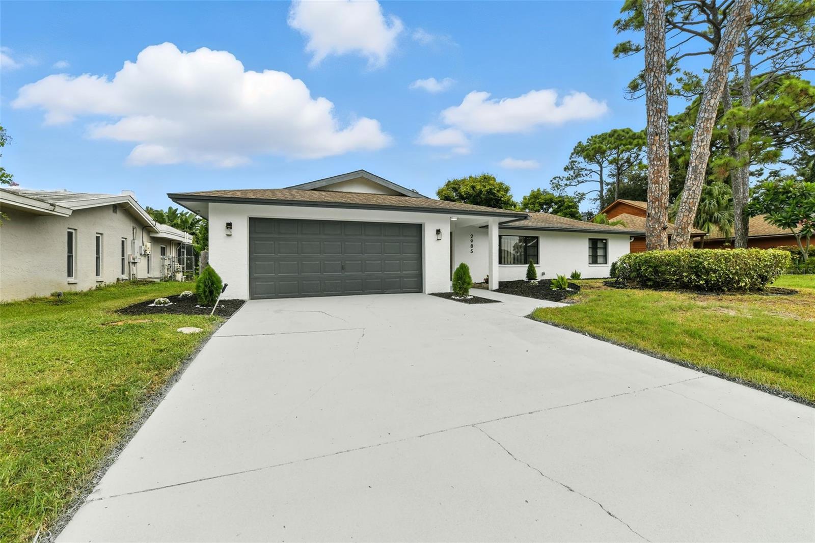 Beautifully renovated 3BR/2BA home with 2-car garage in desirable Pinellas Point, St. Pete! This 1,905 SqFt home features an open layout, split floor layout, new flooring, updated kitchen with shaker cabinets, countertops & 5-piece stainless steel appliances, and fully remodeled baths. Spacious bedrooms, natural light, and attention to detail throughout. Move-in ready and minutes from downtown St. Pete, waterfront parks, beaches, dining & shopping. Don’t miss this opportunity—schedule your showing today!