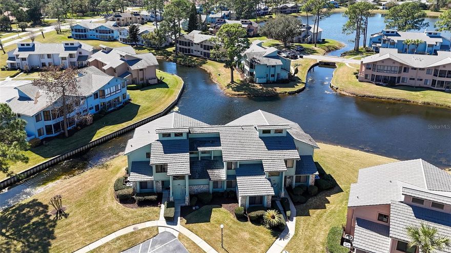 BEAUTIFUL WATER VIEWS! MAINTEANCE FREE LIVING! RACE FANS, GOLFERS, EMBRY RIDDLE STUDENTS, AMAZON DISTRIBUTION WORKERS, NURSES AND BIKERS.....THIS IS THE BEST LOCATION IN DAYTONA BEACH! 24 hour gated, guarded golf community, BUT you don't have to play Golf to live here! Well maintained and decorated, vaulted ceilings, Bright and light spacious kitchen with lots of counter space, pull-out pantry, and eat-in dining area.
 21x 10 screened, covered balcony overlooking some beautiful canal views something that can't be changed, watch the awesome Florida wildlife, which includes white herons, colorful sandhill cranes, fish and otters swimming. The Bonus Open Loft can be converted to a 2nd bedroom or keep as an office space.
Primary bedroom with water views and 7x5 walk-in closet. Big private shower and access to the balcony from bedroom, living room and kitchen. Convenient location to............DAYTONA'S FAMOUS BEACH, DAYTONA INTERNATIONA SPEEDWAY, EMBRY-RIDDLE AERONAUTICAL UNIVERSITY, SHOPPING, DAYTONA AIRPORT, HAIFAX HEALTH MEDICAL CENTER AND.....AMAZON DISTRIBUTION CENTER, & RESTAURANTS GALORE! Sandpiper Lakes monthly fee covers: Exterior insurance, roof, water, sewer, garbage, internet, cable TV, lawn, sprinklers, common areas Also don't leave the subdivision, drive your golf cart over to the restaurant opened in the Clubhouse and the food is great! Don't have to be a member to eat there, they have ongoing activities every month and you don't have to be a member to come and listen to some music or play trivia. You can have a wedding in one of the clubhouses banquet rooms that can be rented and catered. Community Pool will be opening in April the whole family can join with a pool membership. Public 18-hole golf course opened 7 days. Need more details call me........