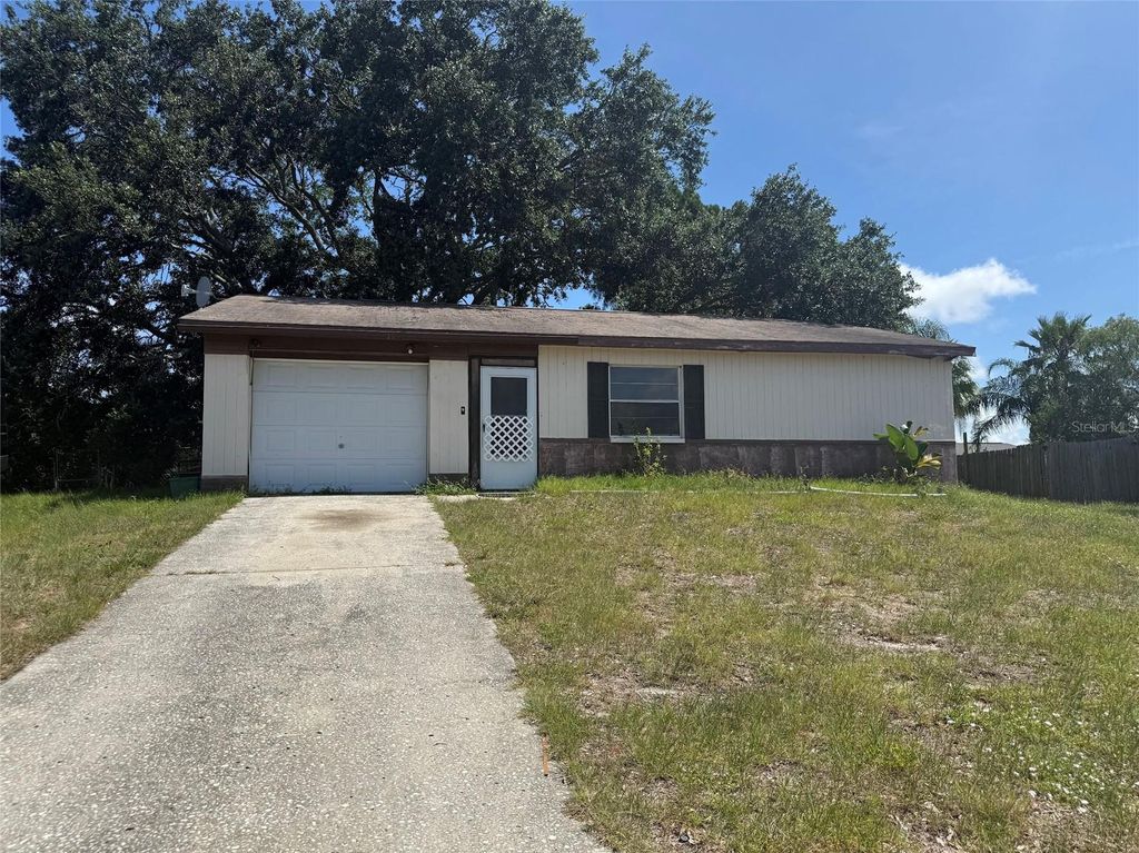 Photo of 1306 Dukes Drive, Tarpon Springs, FL 34689 (MLS # TB8520663)