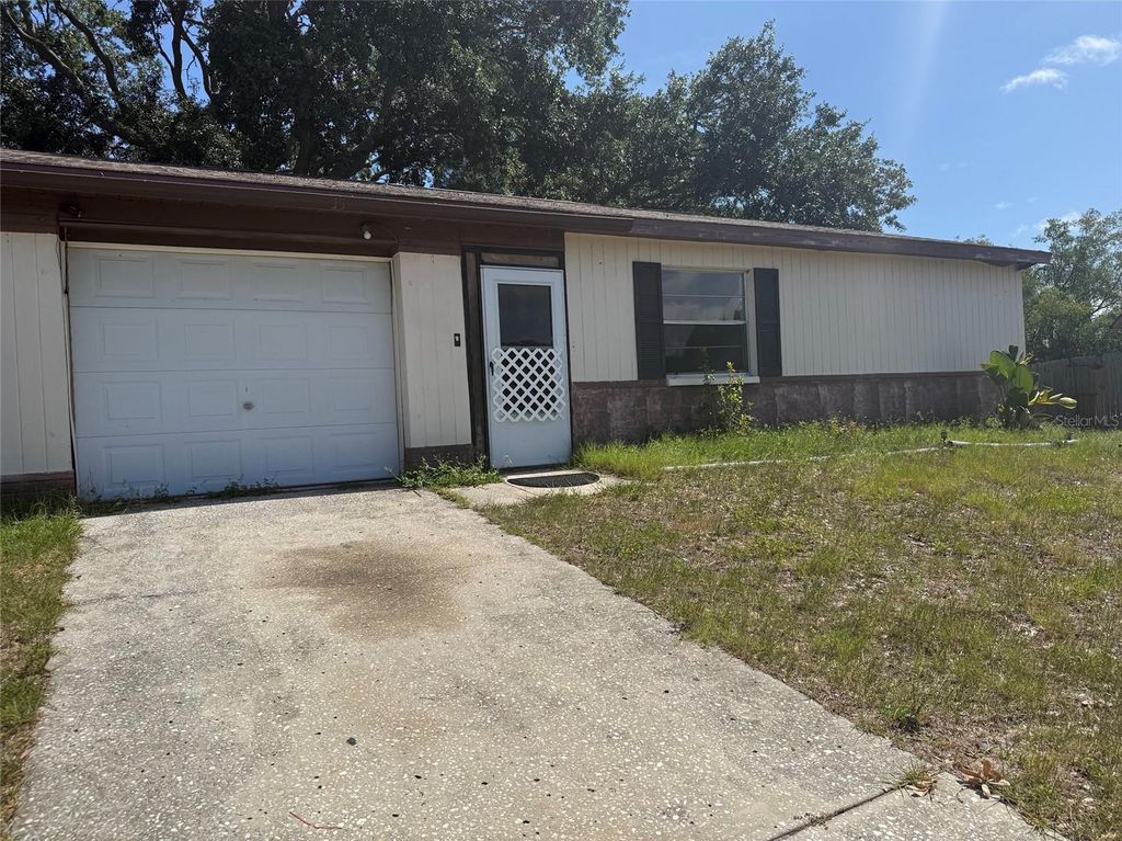 Photo of 1306 Dukes Drive, Tarpon Springs, FL 34689 (MLS # TB8520663)