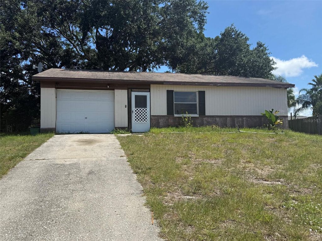 Photo of 1306 Dukes Drive, Tarpon Springs, FL 34689 (MLS # TB8520663)