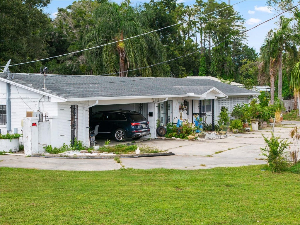 Photo of 8414 N Grady Avenue, Tampa, FL 33614 (MLS # A4703036)
