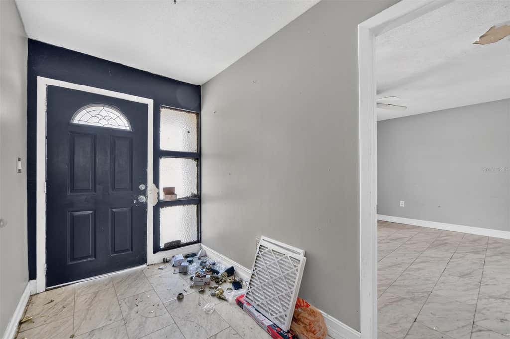 Photo of 434 Diamond Acres Road, Davenport, FL 33837 (MLS # C7527731)