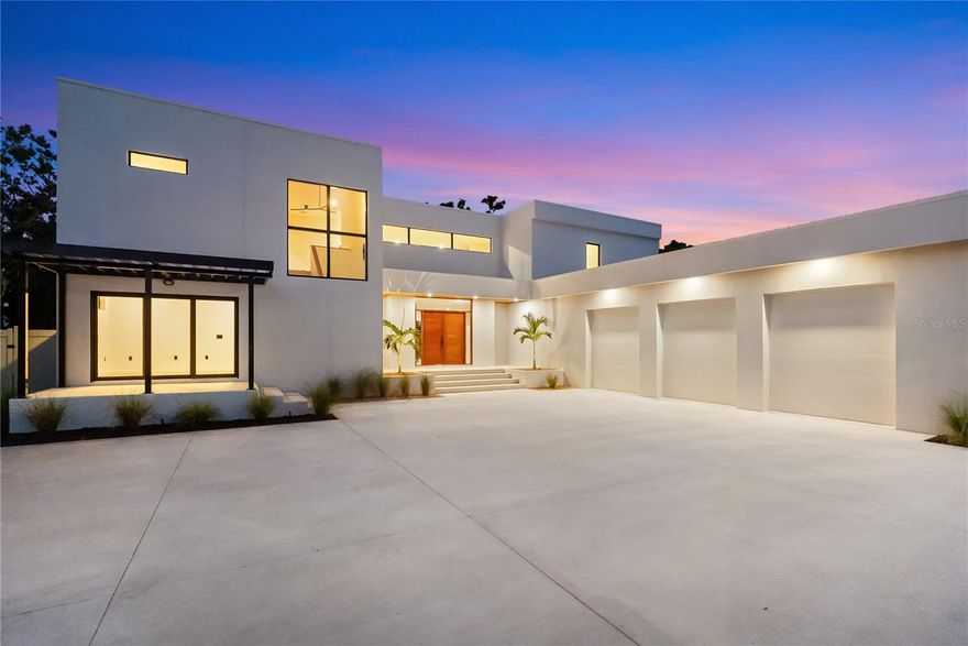 One or more photo(s) has been virtually staged. West of Trail luxury meets modern innovation at 1759 Waldemere Street. This brand-new, custom-built residence embodies timeless design, contemporary craftsmanship, and intentional indoor–outdoor living.

Set on a .33-acre lot just steps from Southside Village and Sarasota Memorial, the home delivers sophistication, convenience, and exceptional attention to detail in one of Sarasota’s most sought-after neighborhoods — a rare opportunity in the coveted West of Trail community.

Spanning 4,513 square feet, the two-story floor plan features four bedrooms, five baths, an office with private entry, and a media room that opens to a 480-square-foot balcony overlooking the property. Designed for both everyday living and elegant entertaining, the home showcases expansive sliding glass doors that blur the line between indoors and out, opening to a heated saltwater pool, spa, and lush landscaped backyard for year-round enjoyment.

The designer kitchen serves as the heart of the home, featuring Sub-Zero and Wolf appliances, custom cabinetry, imported stone, and a hidden butler’s pantry.

The first-floor primary suite epitomizes luxury with zero-corner sliders that open directly to the pool and outdoor living area. Inside, a spa-inspired bath includes a freestanding tub, walk-in shower, and a custom built-in walk-in closet.

Upstairs, two en suite bedrooms and a second-floor primary suite give privacy for family or guests. A versatile media room and expansive outdoor terrace complete the level, overlooking the serene backyard oasis.

Every detail has been thoughtfully curated — from the bespoke, locally handcrafted Sapele wood entry door to hurricane-impact windows and doors, a three-car garage with epoxy flooring, and professional landscaping surrounding the fenced backyard.

Ideally located in the highly regarded Southside Elementary School district, near Sarasota Memorial Hospital and the shops and dining of Southside Village, with downtown Sarasota, Siesta Key, Lido Key, and St. Armands Circle just minutes away.

This is more than a home — it’s a statement of Sarasota luxury living.