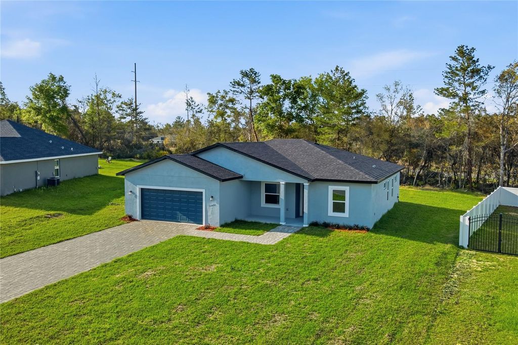 Photo of 13695 SW 40th Circle, Ocala, FL 34473 (MLS # O6397769)