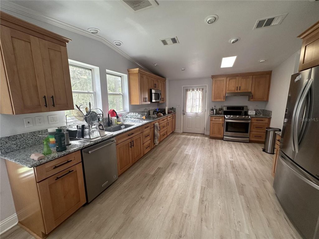 Photo of 10809 Cedar Cove Drive, Thonotosassa, FL 33592 (MLS # O6350094)