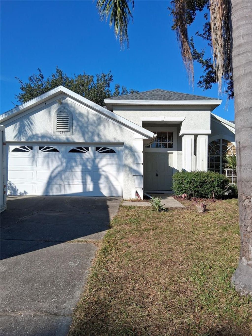 Photo of 654 Bent Oak Loop, Davenport, FL 33837 (MLS # B4902110)