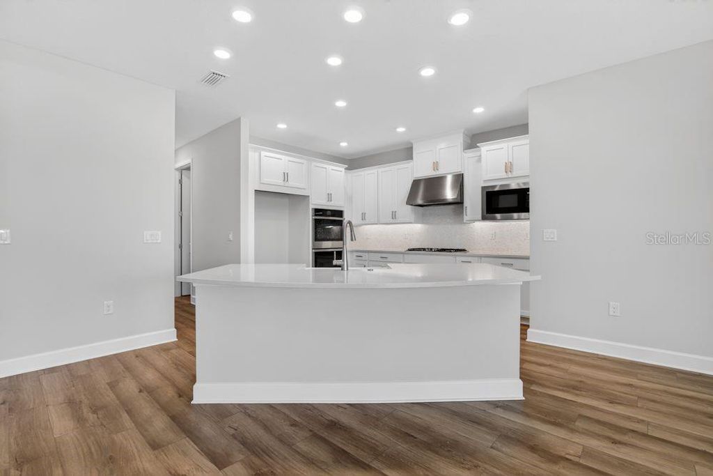 Photo of 656 Junonia Boulevard, New Smyrna Beach, FL 32168 (MLS # TB8487320)