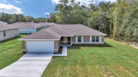 Photo of 8301 SW 128th Loop, Ocala, FL 34473 (MLS # OM700708)
