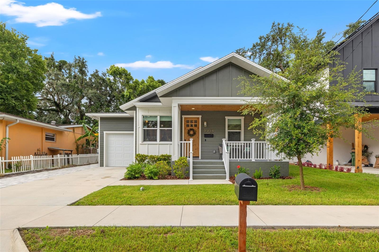 Intentionally designed and full of charm, this 2023-built home in Seminole Heights seamlessly blends modern upgrades with craftsman-inspired warmth. Wrapped in Hardie Board siding and framed by a welcoming front porch with a pine ceiling, the curb appeal sets the tone for what’s inside. Offering 3 bedrooms, 2 bathrooms, and 1,526 square feet of living space, every inch has been thoughtfully crafted for both function and style.
Step inside to soaring 9'4" ceilings, 8' doors, crown molding, and beautiful custom trim work throughout. The kitchen is a true standout, featuring quartz countertops with bar seating, a statement-making 6-foot custom island, LG appliances, a gas range, open shelving, extra cabinetry, and recessed lighting. Cozy up in the built-in reading nook and enjoy the open layout that flows effortlessly from living to dining.
The spacious primary suite features dual walk-in closets with custom built-ins, and every closet in the home has been upgraded with built-in storage solutions. The dedicated laundry room includes built-in cabinetry, a butcher block countertop, and a washer and gas dryer. Hurricane-impact windows and custom blinds provide comfort and peace of mind throughout. Additional highlights include updated light fixtures, two hallway storage closets, Ecobee smart thermostats, solid core doors, and a gas tankless water heater for energy efficiency.
Out back, the fully fenced and landscaped yard offers a covered paver patio with TV hookup, string lights, two ceiling fans, a small storage area, and electric—perfect for relaxing or entertaining. The attached garage includes overhead storage racks, and the extended driveway provides ample parking.
Located in one of Tampa’s most beloved historic neighborhoods, this home delivers exceptional craftsmanship, thoughtful upgrades, and effortless style.
Situated in a walkable, vibrant neighborhood with four scenic parks along the Hillsborough River, this home is just minutes from Downtown Tampa and the beloved dining and breweries of Seminole Heights. Enjoy easy access to shopping, entertainment, I-275, and everything the city has to provide.
