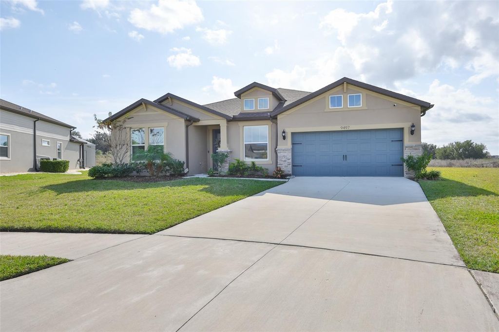 Photo of 9497 Ibis Grove Boulevard, Wesley Chapel, FL 33545 (MLS # TB8465516)