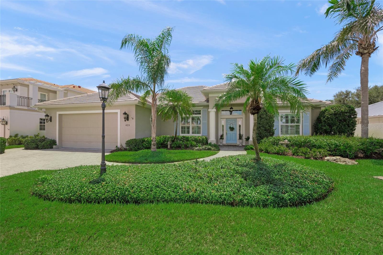Welcome to your Venice Island coastal retreat…JUST STEPS FROM THE SAND! Nestled on the highly sought-after Spadaro Drive, this 3-bedroom, 2-bathroom custom home offers exclusive deeded beach access to the private Golden Beach, making it the perfect Florida Gulf Coast escape. Built in 2004 by Caithness Construction LLC, this 2,300 sq ft home showcases timeless architecture and quality craftsmanship, including crown molding and trim throughout. The thoughtfully designed layout blends indoor and outdoor living with ease, offering tropical pool views from nearly every room. The elegant great room features a coffered ceiling and custom built-in cabinetry with accent lighting, perfect for displaying art or treasured collections. The spacious kitchen includes granite countertops, abundant cabinetry and a charming breakfast nook overlooking the outdoor living area. The luxurious primary suite is a private haven, complete with 2 walk-in closets and en-suite bathroom with dual vanities and a Roman shower, plus a cozy sitting area with French doors opening to the lanai. A split floorplan ensures privacy, with two additional bedrooms on the opposite side of the home with its own access to the lanai. The laundry room includes a built-in pocket office and is conveniently located near the kitchen and garage. With a southern exposure, the pool and spa provide a private and peaceful outdoor oasis surrounded by lush landscaping, perfect for relaxing or entertaining outdoors. Built with exceptional structural integrity, this home includes steel reinforced concrete block construction, a poured concrete tie-beam around the home, PGT impact-resistant windows, insulated garage door and a whole-house generator. For added peace of mind, both the home and street elevations exceed current flood zone requirements. Enjoy a direct view of the blue Gulf waters from your street and quick access to the gated Golden Beach entrance – ideal for beach walks, sunset views and relaxing at the private pavilion. You are also minutes from historic Venice Main Street, boutique shops, restaurants, the Venice Performing Arts Theatre, local Farmer’s market, Venice Dog Park and a variety of water activities. Whether you’re seeking the Island life, beach breezes or seamless indoor-outdoor living, this home is coastal luxury living at its finest on Venice Island.