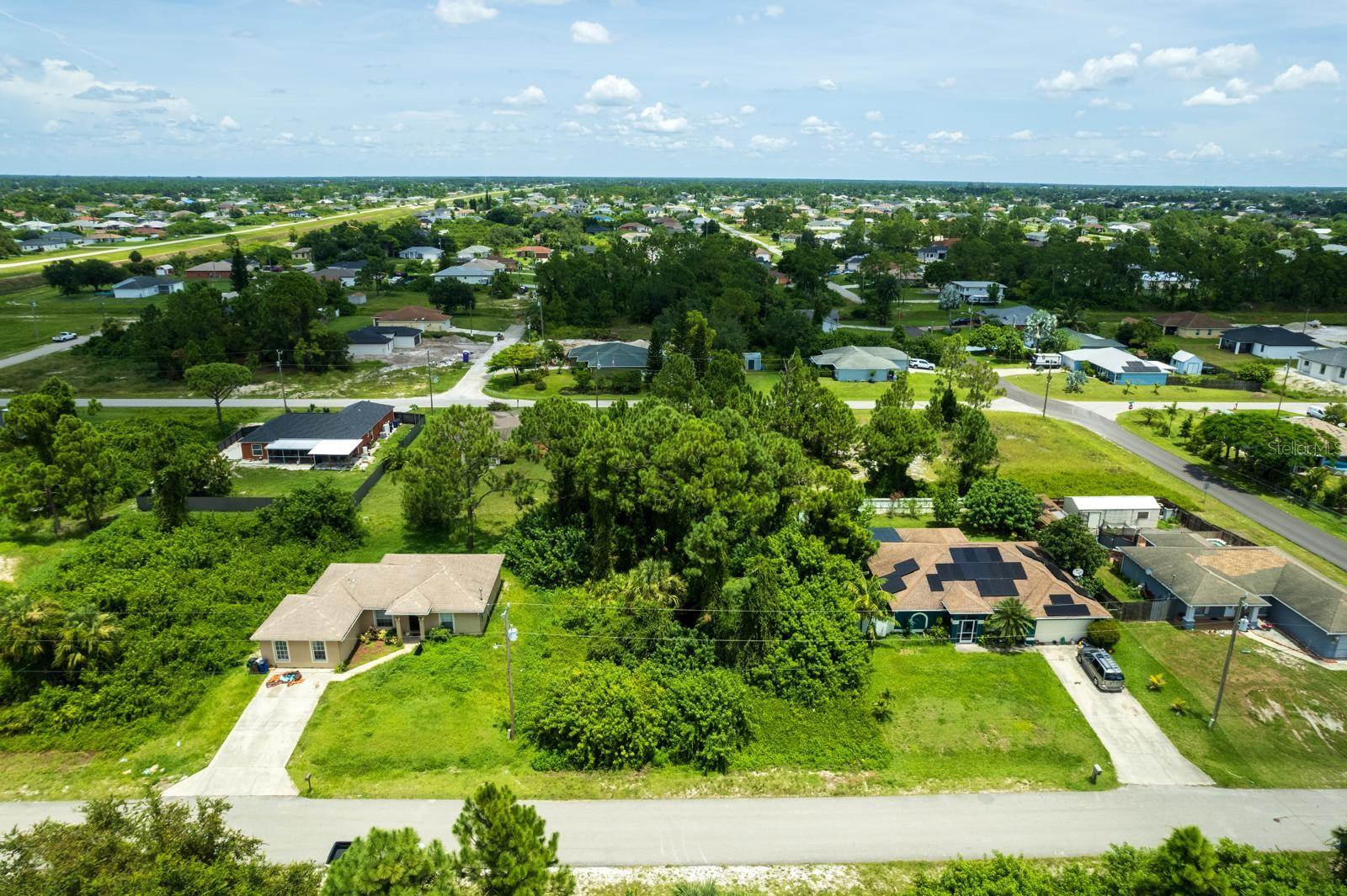 This spacious lot located at 3016 33rd St SW, Lehigh Acres, FL 33976, offers an excellent opportunity to build your dream home or invest in one of Lee County’s growing communities. Nestled in a peaceful neighborhood, the property provides privacy while remaining conveniently close to local schools, shopping, and essential amenities. With ample space and strong potential for future appreciation, this lot is perfect for residential development. Don’t miss your chance to secure this property and create the home or investment you’ve been envisioning!